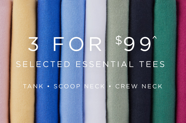 folded colourful tees with promotional text 